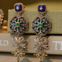 Boucles d’Oreilles Majestueuses – Pierres Vert Émeraude & Accents Dorés